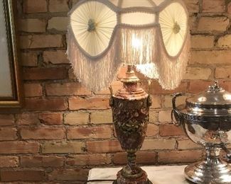 $450.00 Pair of antique French rouge marble urn shaped table lamps with floral and garland gilt ormolu, circa 1920s, extensive damage and repairs to one. 