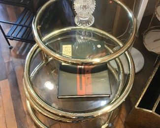 $85.00 Circular brass cocktail table.  Top circle moves.  