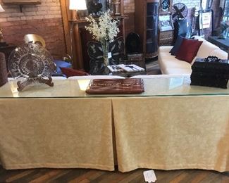 $175.00 Custom made sofa table with boxpleted gold damask tablecloth and custom glass top commissioned by Pleats Interior design  