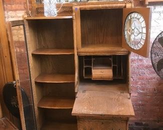$695.00 Antique oak secretary/bookcase side by side combination, with curved glass door on left, leaded beveled glass door on top right, and beveled mirror on very top- circa 1900