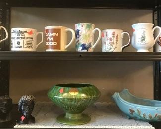 $3.00 Each mugs.  $6.00 Pair of African heads.    $5.00 Each ceramic pieces.  