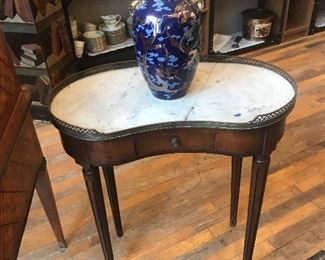 $275.00 Antique Louis XVI style kidney shaped single drawer table with marble top and brass partial gallery - circa 1920s - 1940s - breaks to marble top.                                                 $45.00 Asian blue vase with gold dragon decoration 