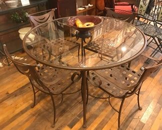 $350.00 48" Round glass and iron table with 4 matching arm chairs in "Drama Curtain" design (purchased from the Mole Hole)  