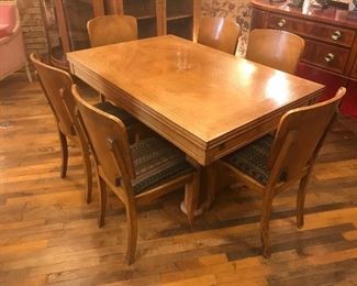 $1,195.00 Antique European Streamline deco dining set. Extension table with 6 matching chairs, custom upholstered with navajo inspired fabric.  
