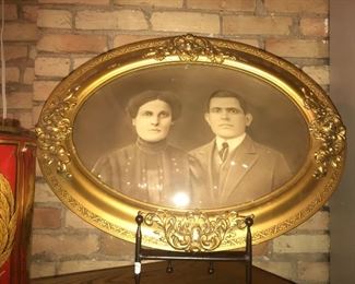 $65.00 Really neat oval frame with convex glass and instant ancestors, circa 1910.  