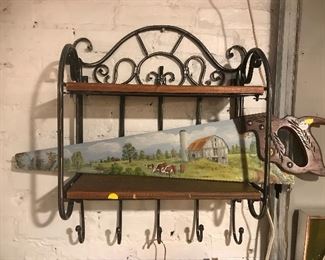 $30.00 hand painted saw picture.  $15  metal and wood hanging shelf with hooks on the bottom.  12" wide.