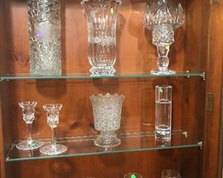$18.00 tall cut glass vase   $6.00 vase,  $6.00 candle holder,  $35.00 Pr. Waterford candlesticks, $6 celery, $8 set of 4 etched glasses.