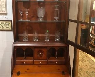 $125.00 Pine secretary, Colonial Revival style, with lighted top and glass shelves 