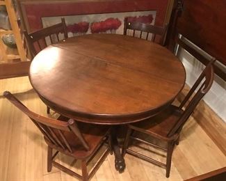 $195.00 42" Antique round wood table with 4 matching wood chairs
