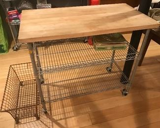 $45.00 cart on wheels with wire shelves and butcher block type top