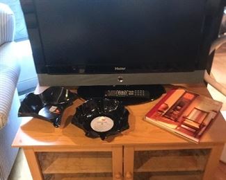 $45 Haier Model HLC32-A 32" TV.   $40.00 2 door TV Stand.  $2 each Old records made into bowls.  $10  Coffee Table Bool In The Arts and Crafts Style.