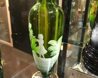 $45.00 Mary Gregory green glass with white decoration  9” vase  