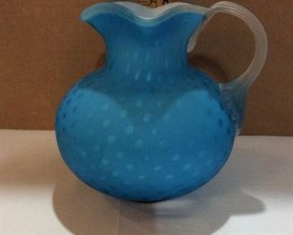 $45.00  Cased glass 8” pitcher with reeded applied handle in blue and white.  No marks.  