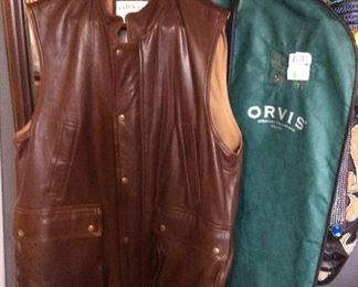 $95.00  Orvis luxury brown leather Munitions vest size XL.   With storage bag.  Excellent condition.  