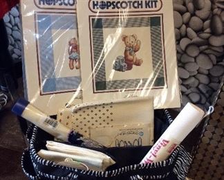 $15  Tote and contents of cross stitch kits and canvas.  Stuck at home.  Learn a new hobby!