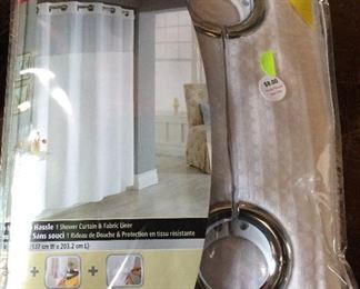$8.00 Stall shower curtain.  New in package  54 x 80  White with liner