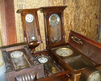 collection of antique wall clocks