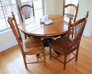 Kitchen table with 4 chairs (one of the chairs has damage)