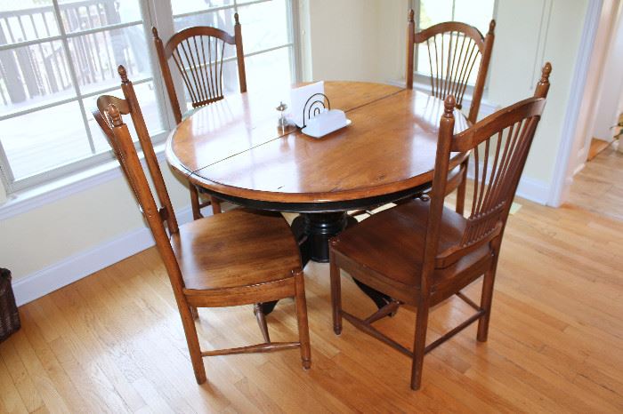 Kitchen table with 4 chairs (one of the chairs has damage)