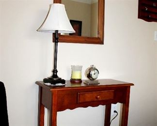 Small table, mirror, lamp