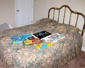 Queen bed with brass headboard