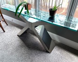 Glass top console  table with chrome base, 67” by 30” by 19”