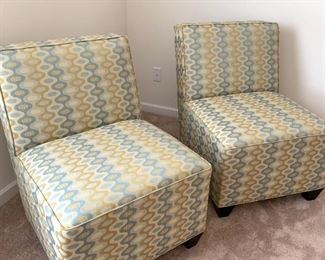 Pair of matching armless chairs