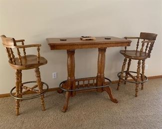 Pub table and two coordinating bar stools 