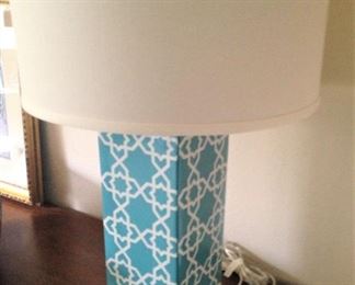One of two matching contemporary lamps
