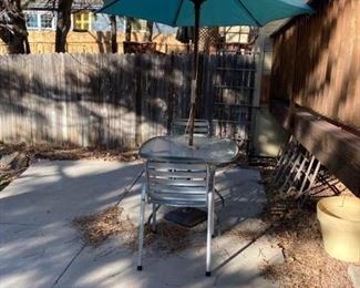 Patio Table, Chairs, and Umbrella