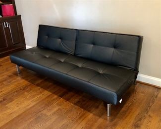 Innovation Leather Futon ( Turns into Bed). $650.
