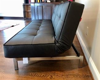 Innovation Leather Futon ( Turns into Bed). $650.
