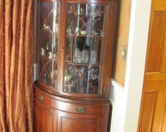 $75.00 mahogany Corner china cabinet