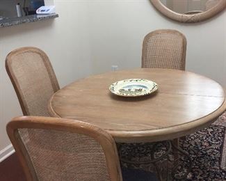 Kincaid wood & iron table with one leaf with Drexel cane back chairs (4 arm, 2 side)