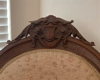 Detail view of arm chair carving