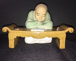 Porcelain monk figurine