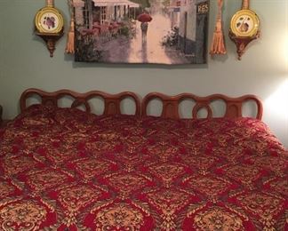 Vintage King bed; Sealy Posturepedic mattress; tapestry in between wall brackets and plates