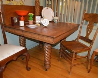 oak pub table, spiral legs, center leg & leaf $225