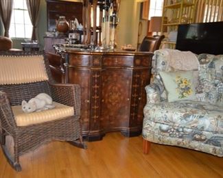 antique wicker rocker $125; cellarette $65; upholstered chair$75