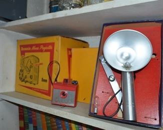 Brownie move projector, Savoy box camera SOLD, flash, Brownie Handy Carry Case w/Brownie Movie camera, Kodak field case, Brownie field light & 2 reflector flood lamps - new old stock