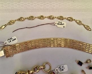 14k gold bracelets - top $300; Bottom $1,600.