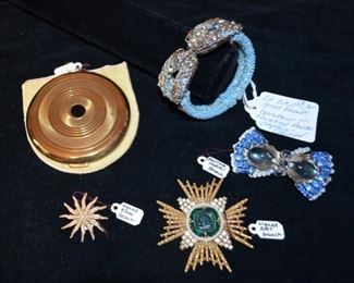 Vintage New York Coty compact; Mariam Haskell light blue faceted hinge bracelet w/ hand sewn seeded Austrian crystals $275, signed "Cinor" brooch; signed "Art" brooch; signed "Mariam Haskek" blue brooch$175.