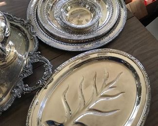 Silver Plated Meat Tray -- $30
Silver Plated large Round Reticulated Tray -- $20
Silver Plated smaller Round Reticulated Tray -- $15
Silver Plated Reticulated Bowl -- $10
Small Reed & Barton Silver Plated Nut Bowl -- $5