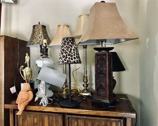 White Milk Glass Lamp -- $30                                          
Wooden Column Lamp -- $40                                                 Small Brass Lamp -- $10