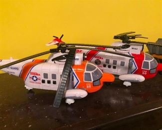 Toy helicopters -- seriously you should admire me for forging on after I've eaten a burning bowl of solid lava