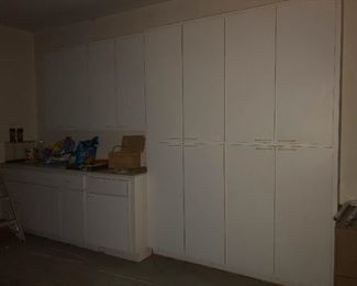 These garage cabinets are for sale! EVERYTHING can be bought! Even ME for a bottle of La Crema chardonnay!