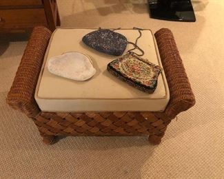 beaded purses and rattan cushion stool