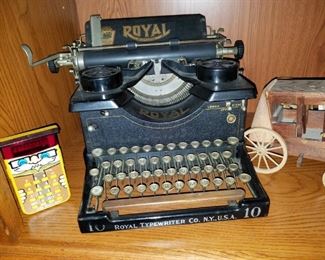 selection of vintage/antique cameras, telephones and typewriters