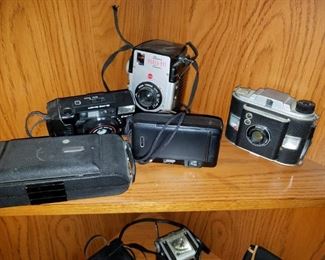 selection of vintage/antique cameras, telephones and typewriters