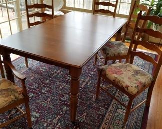dining table with 2 leaves and 6 upholstered chairs